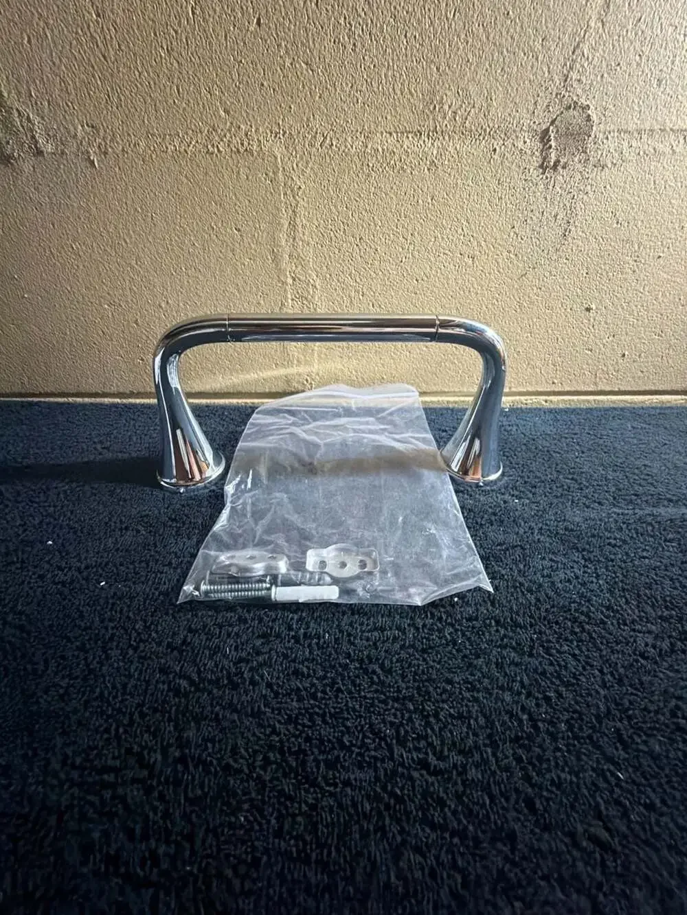 Delta Kayra Pivoting Toilet Paper Holder in Chrome  8”